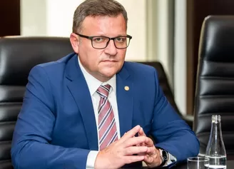 PSD cere demisia premierului Bolojan!